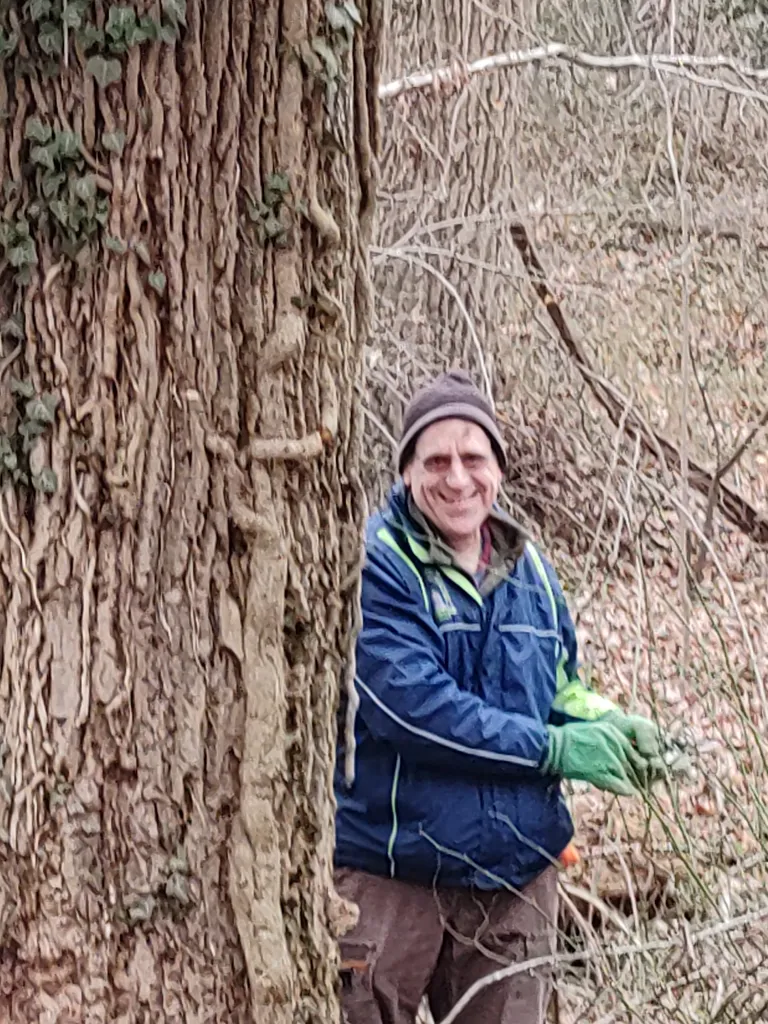 man beside tree