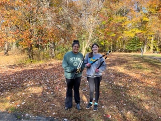 volunteers with loppers